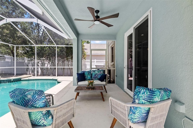 16206 Nottingham Park Way, Tampa, FL 33647 - view of pool featuring a patio area, ceiling fan, an outdoor living space, and glass enclosure