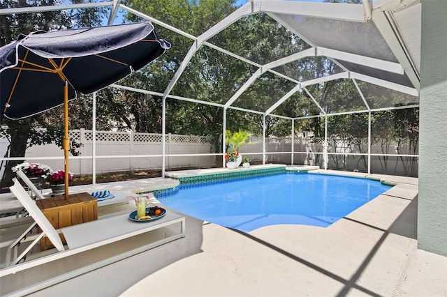 16206 Nottingham Park Way, Tampa, FL 33647 - view of swimming pool with a fenced backyard, a patio area, and glass enclosure