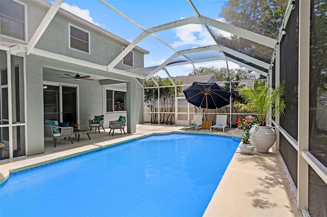 16206 Nottingham Park Way, Tampa, FL 33647 - view of swimming pool featuring an outdoor hangout area, a patio, a ceiling fan, and a lanai