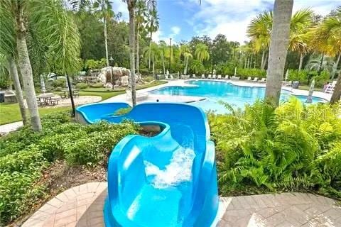 16206 Nottingham Park Way, Tampa, FL 33647 - swimming pool featuring view of wooded area