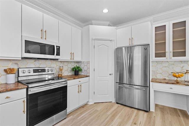 16206 Nottingham Park Way, Tampa, FL 33647 - kitchen with stainless steel appliances, white cabinetry, crown molding, light wood-type flooring, and glass insert cabinets
