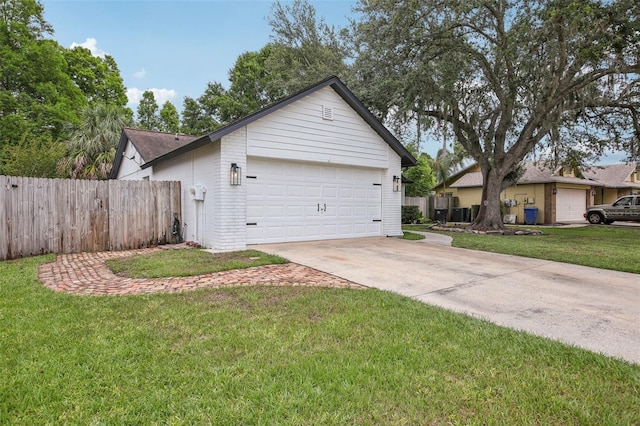 view of front facade with an attached garage, driveway, and brick siding