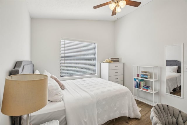 bedroom with wood finished floors and a ceiling fan