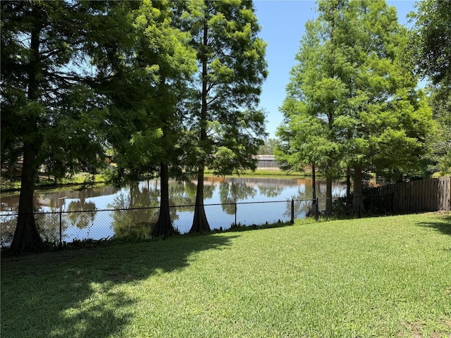 water view featuring fence