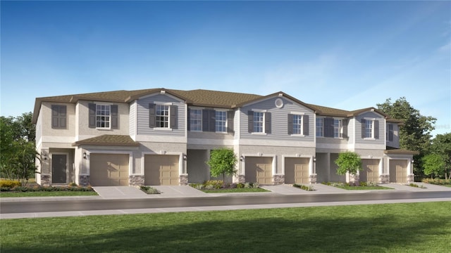 view of property with a garage, stucco siding, stone siding, and a front lawn