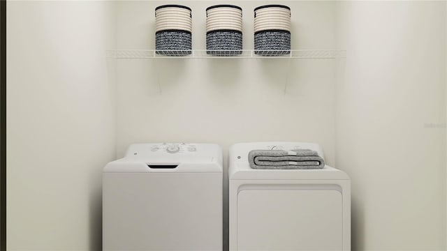 laundry area with washer and dryer