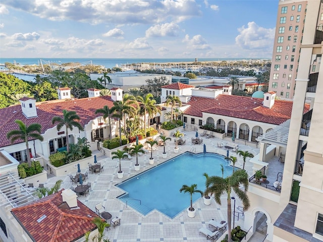 300 Beach Dr NE Unit 401, Saint Petersburg, FL 33701 - community pool with a water view and a patio
