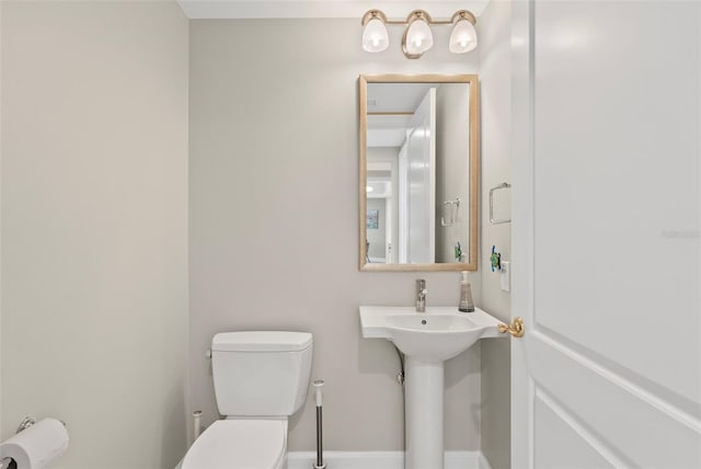 300 Beach Dr NE Unit 401, Saint Petersburg, FL 33701 - half bath with toilet and baseboards
