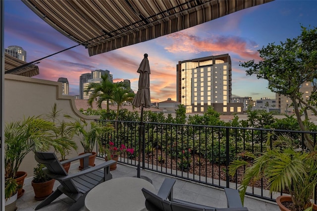 300 Beach Dr NE Unit 401, Saint Petersburg, FL 33701 - balcony at dusk with a view of city