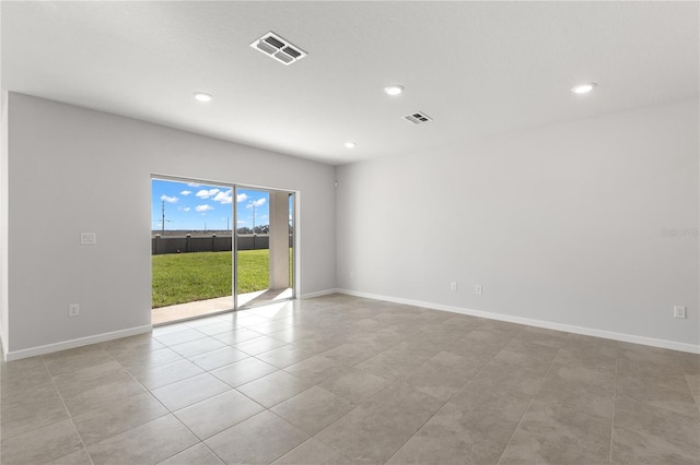 9066 Rally Spring Loop, Wesley Chapel, FL 33545 - empty room with recessed lighting, light tile patterned floors, and baseboards
