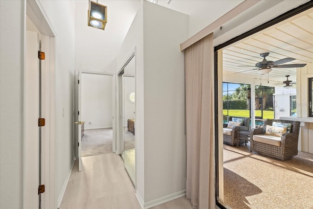 2886 Green Meadow Ct, Clearwater, FL 33761 - hall with baseboards and light wood-type flooring