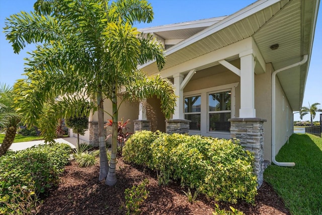 5547 Silver Sun Dr, Apollo Beach, FL 33572 - view of home's exterior with stone siding and stucco siding