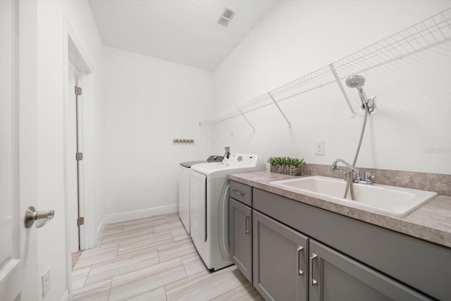5547 Silver Sun Dr, Apollo Beach, FL 33572 - washroom featuring washer and dryer, cabinet space, and baseboards