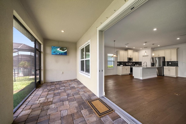 5547 Silver Sun Dr, Apollo Beach, FL 33572 - unfurnished sunroom with a sink