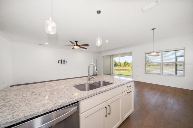 5547 Silver Sun Dr, Apollo Beach, FL 33572 - kitchen with a sink, stainless steel dishwasher, crown molding, hanging light fixtures, and white cabinetry