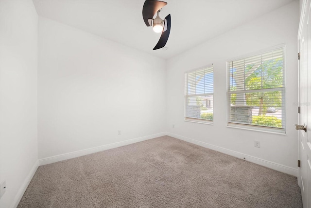 5547 Silver Sun Dr, Apollo Beach, FL 33572 - empty room featuring carpet, baseboards, and a ceiling fan