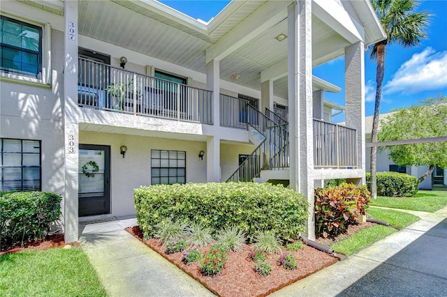 2139 Elm St Unit 308, Dunedin, FL 34698 - view of building exterior featuring stairs