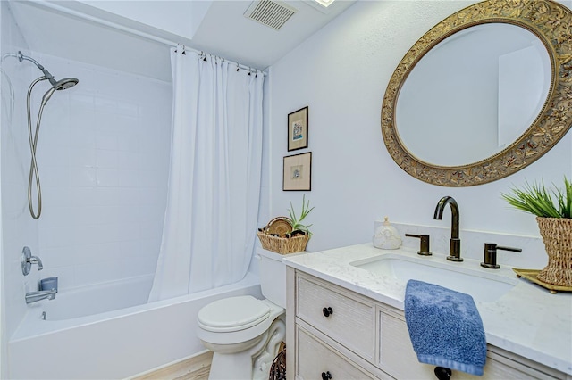 2139 Elm St Unit 308, Dunedin, FL 34698 - full bathroom with toilet, vanity, and shower / tub combo
