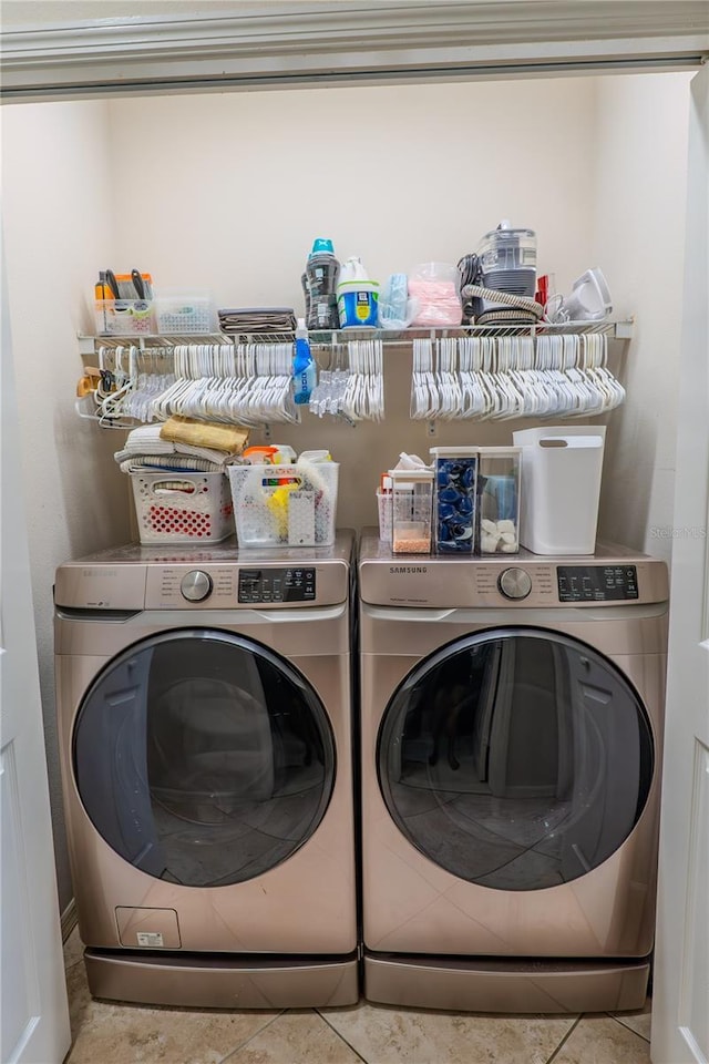 laundry area with separate washer and dryer