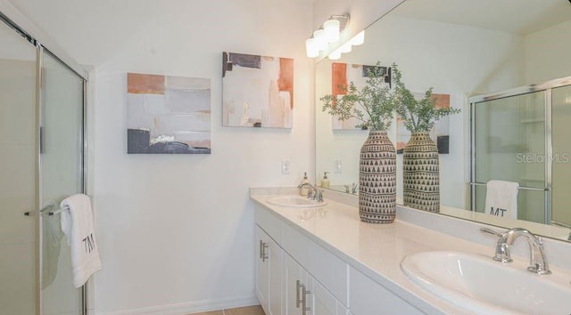 2415 Slippery Rock St, Auburndale, FL 33823 - bathroom with a shower stall and double vanity