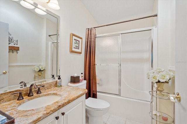 2121 Escobar Ave, Lady Lake, FL 32159 - bathroom featuring tile patterned flooring, shower / bath combo with shower curtain, toilet, and vanity
