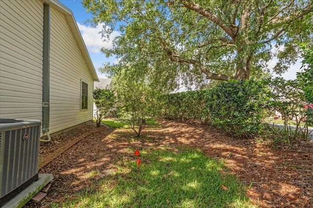 2121 Escobar Ave, Lady Lake, FL 32159 - view of yard with central AC unit