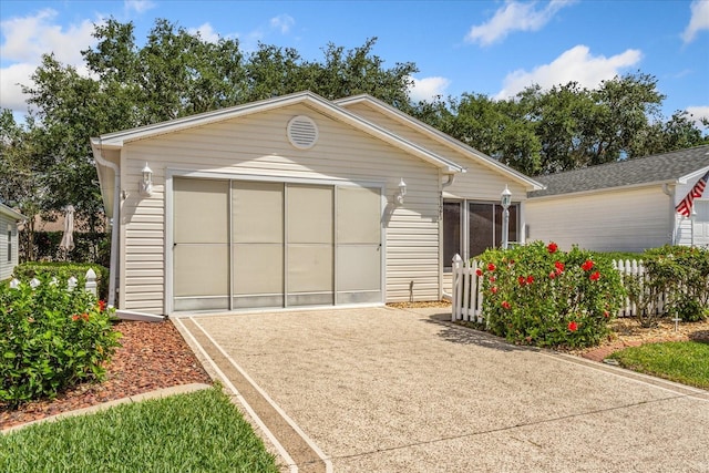 2121 Escobar Ave, Lady Lake, FL 32159 - view of front facade with driveway