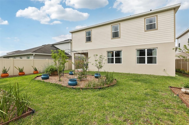 392 Summer Squall Rd, Davenport, FL 33837 - rear view of property with stucco siding