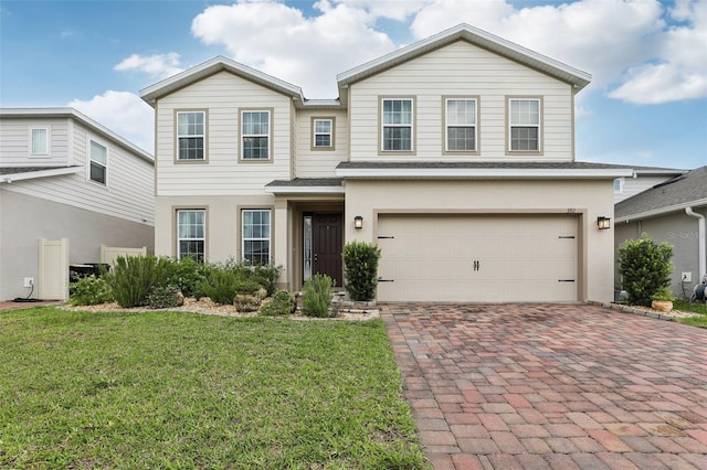 392 Summer Squall Rd, Davenport, FL 33837 - view of front of house with a garage, decorative driveway, a front yard, stucco siding, and roof with shingles