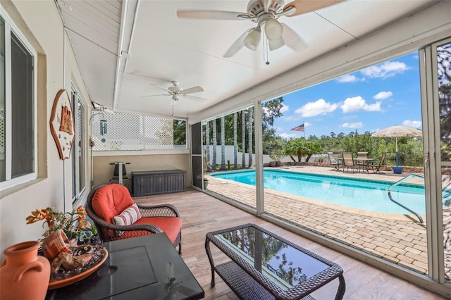 view of pool featuring ceiling fan, an outdoor hangout area, outdoor dining area, and a patio