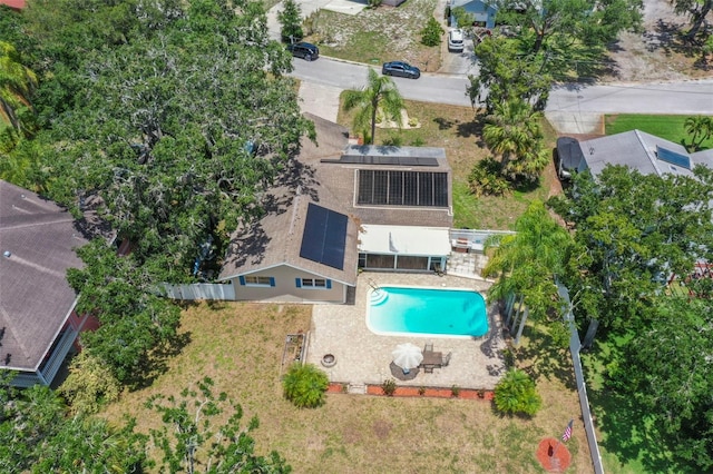 view of subject property featuring a pool