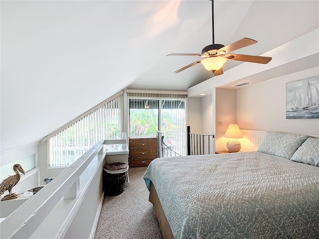2695 N Seabreeze Pt Unit I1, Crystal River, FL 34429 - bedroom with carpet flooring, lofted ceiling, multiple windows, and ceiling fan