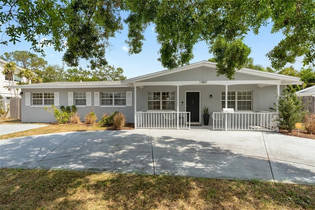 1489 77th Ave N, Saint Petersburg, FL 33702 - ranch-style home with covered porch and brick siding