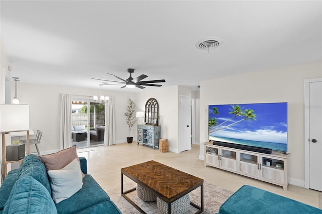 1489 77th Ave N, Saint Petersburg, FL 33702 - living room with ceiling fan and baseboards