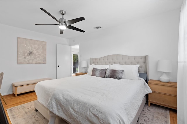 1489 77th Ave N, Saint Petersburg, FL 33702 - bedroom with light wood finished floors, baseboards, and a ceiling fan