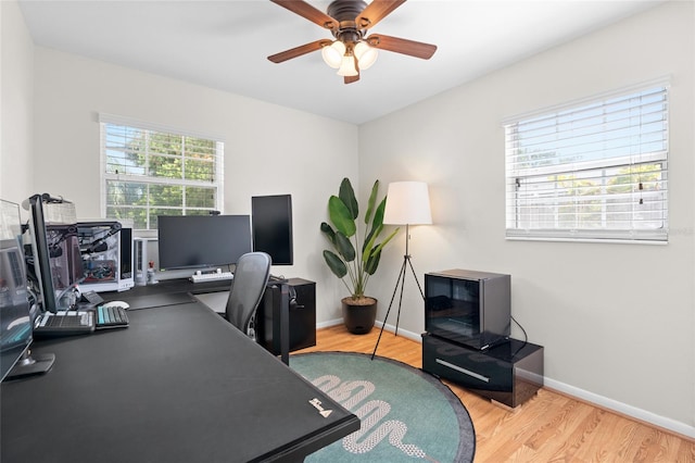 1489 77th Ave N, Saint Petersburg, FL 33702 - office with a ceiling fan, wood finished floors, and baseboards