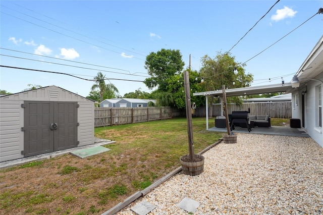 1489 77th Ave N, Saint Petersburg, FL 33702 - view of yard featuring a patio area, a shed, and an outdoor structure