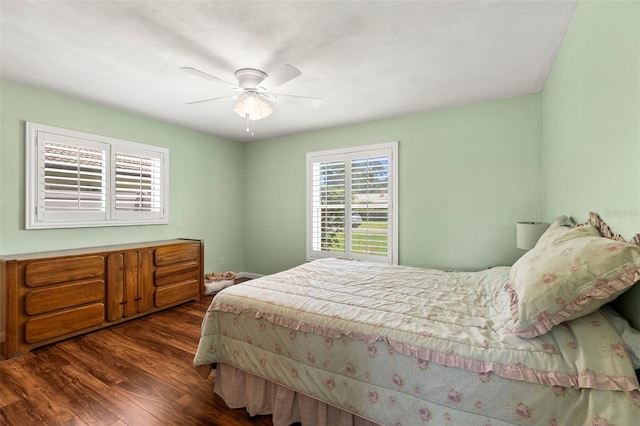 bedroom with wood finished floors and ceiling fan