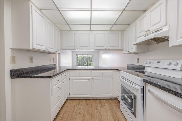kitchen featuring under cabinet range hood, white electric range, a paneled ceiling, light wood-style floors, and white cabinets