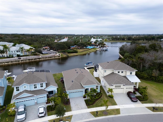 aerial view of residential area with a nearby body of water