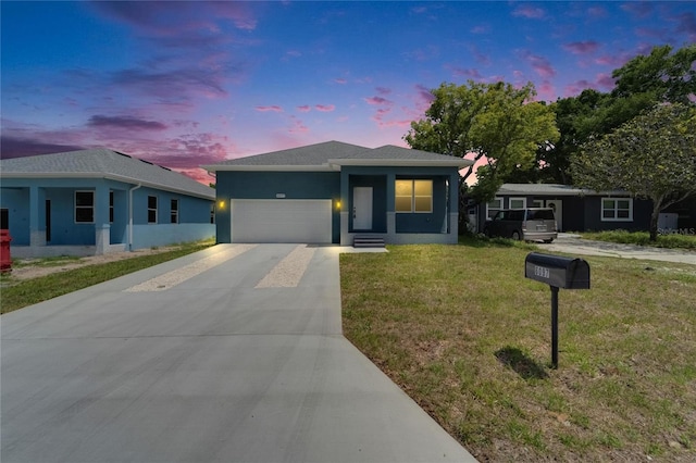 6097 Vermont Ave, New Port Richey, FL 34653 - view of front facade with a garage, concrete driveway, a front yard, and stucco siding