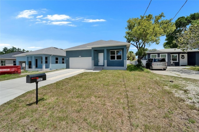 6097 Vermont Ave, New Port Richey, FL 34653 - view of front of property with a front yard, stucco siding, a garage, and concrete driveway