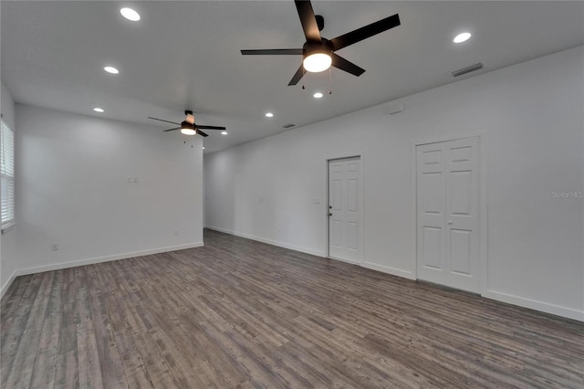 6097 Vermont Ave, New Port Richey, FL 34653 - unfurnished room with ceiling fan, wood finished floors, recessed lighting, and baseboards