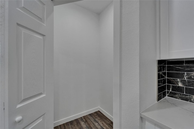 6097 Vermont Ave, New Port Richey, FL 34653 - detailed view of wood finished floors and baseboards