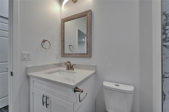 6097 Vermont Ave, New Port Richey, FL 34653 - bathroom featuring vanity and toilet