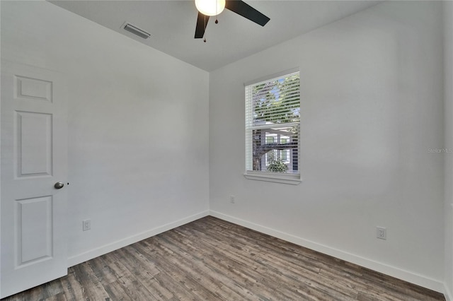 6097 Vermont Ave, New Port Richey, FL 34653 - spare room featuring a ceiling fan, baseboards, and wood finished floors