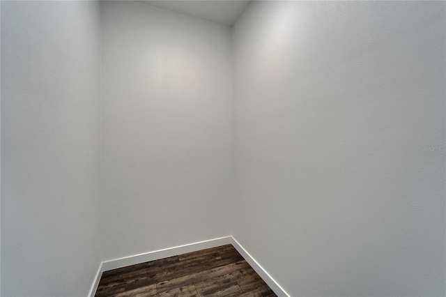 6097 Vermont Ave, New Port Richey, FL 34653 - spare room with baseboards and dark wood finished floors