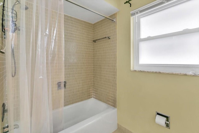 1666 Souvenir Dr, Clearwater, FL 33755 - bathroom with shower / bath combo with shower curtain