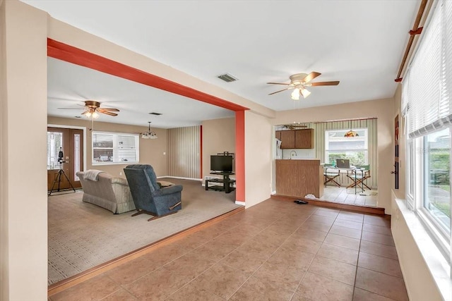 1666 Souvenir Dr, Clearwater, FL 33755 - tiled living area featuring a ceiling fan