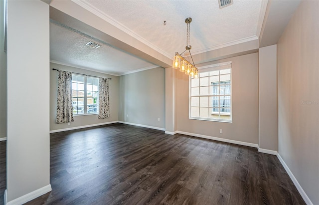 1712 Crossvine Ct, Trinity, FL 34655 - spare room with a textured ceiling, dark wood finished floors, a chandelier, and crown molding